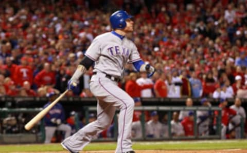 ST LOUIS, MO – OCTOBER 27: Josh Hamilton #32 of the Texas Rangers hits a two-run home run in the 10th inning during Game Six of the MLB World Series against the St. Louis Cardinals at Busch Stadium on October 27, 2011 in St Louis, Missouri. (Photo by Jamie Squire/Getty Images)