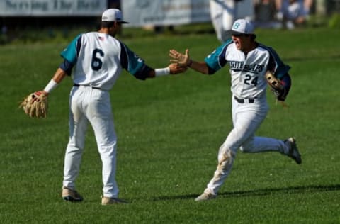 BREWSTER, MA – AUGUST 13: Hunter Bishop, right, and AJ Graffanino of the Brewster Whitecaps celebrate in the seventh inning during game three of the Cape Cod League Championship Series against the Bourne Braves at Stony Brook Field on August 13, 2017 in Brewster, Massachusetts. The Cape Cod League was founded in 1885 and is the premier summer baseball league for college athletes. Over 1100 of these student athletes have gone on to compete in MLB including Chris Sale, Carlton Fisk, Joe Girardi, Nomar Garciaparra and Jason Varitek. The chance to see future big league stars up close makes Cape Cod League games a popular activity for the families in each of the 10 towns on the Cape to host a team. (Photo by Maddie Meyer/Getty Images)