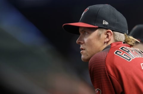 PHOENIX, ARIZONA – APRIL 28: Zack Greinke #21 of the Arizona Diamondbacks watches from the dugout during the MLB game against the Chicago Cubs at Chase Field on April 28, 2019 in Phoenix, Arizona. The Cubs defeated the Diamondbacks 6-5 in 15 innings. (Photo by Christian Petersen/Getty Images)