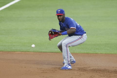 Jul 9, 2020; Arlington, Texas, United States; Texas Rangers third baseman Sherten Apostel (82) fields a ground ball during an intersquad game at Globe Life Field. Mandatory Credit: Tim Heitman-USA TODAY Sports