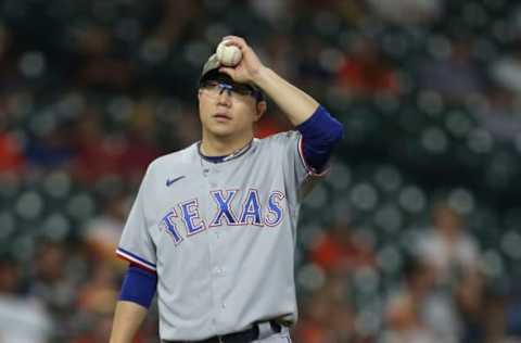 May 14, 2021; Houston, Texas, USA; Texas Rangers relief pitcher Hyeon-Jong Yang (36) waits to pitch to the Houston Astros in the fifth inning at Minute Maid Park. Mandatory Credit: Thomas Shea-USA TODAY Sports