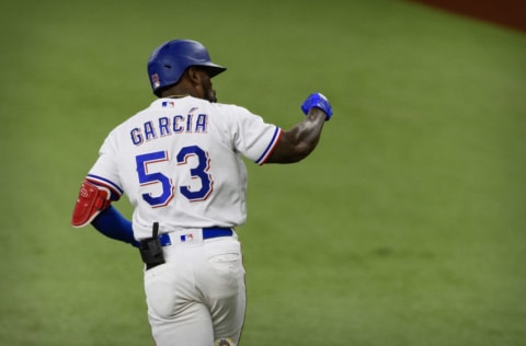 May 22, 2021; Arlington, Texas, USA; Texas Rangers right fielder Adolis Garcia (53) celebrates hitting a home run against the Houston Astros during the fifth inning at Globe Life Field. Mandatory Credit: Jerome Miron-USA TODAY Sports