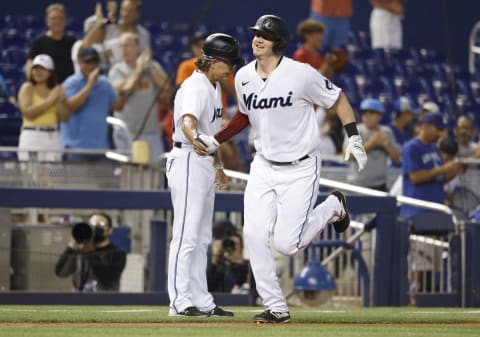 Jul 7, 2021; Miami, Florida, USA; Miami Marlins outfielder Garrett Cooper (26) rounds the bases after hitting a solo home run during the first inning against the Los Angeles Dodgers at loanDepot Park. Mandatory Credit: Rhona Wise-USA TODAY Sports