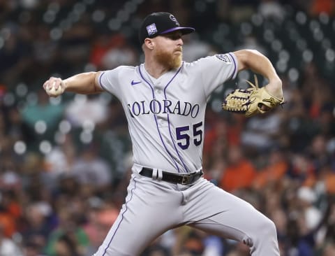 Aug 10, 2021; Houston, Texas, USA; Colorado Rockies starting pitcher Jon Gray (55) delivers a pitch during the second inning against the Houston Astros at Minute Maid Park. Mandatory Credit: Troy Taormina-USA TODAY Sports