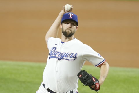 Sep 14, 2021; Arlington, Texas, USA; Texas Rangers starting pitcher Jordan Lyles (24) pitches in the first inning against the Houston Astros at Globe Life Field. Mandatory Credit: Tim Heitman-USA TODAY Sports