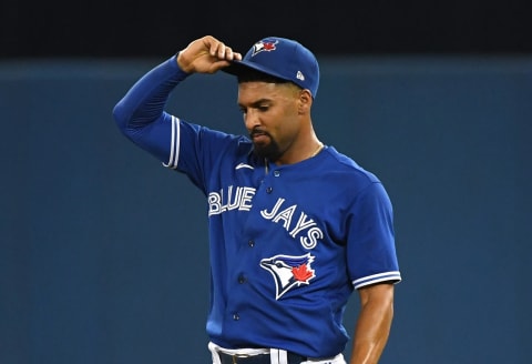 Sep 14, 2021; Toronto, Ontario, CAN; Toronto Blue Jays second baseman Marcus Semien adjusts his cap after an out against the Tampa Bay Rays in the seventh inning at Rogers Centre. Mandatory Credit: Dan Hamilton-USA TODAY Sports