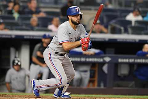 Sep 20, 2021; Bronx, New York, USA; Texas Rangers third baseman Isiah Kiner-Falefa (9) hits an RBI double against the New York Yankees during the fifth inning at Yankee Stadium. Mandatory Credit: Vincent Carchietta-USA TODAY Sports