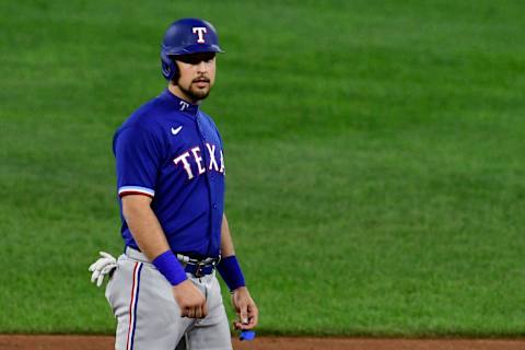 Sep 23, 2021; Baltimore, Maryland, USA; Texas Rangers first baseman Nathaniel Lowe (30) stands at second base during the second inning against the Baltimore Orioles at Oriole Park at Camden Yards. Mandatory Credit: Tommy Gilligan-USA TODAY Sports