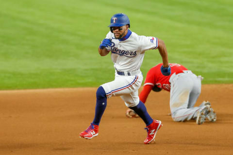 Sep 29, 2021; Arlington, Texas, USA; Texas Rangers center fielder Leody Taveras (3) runs past second base against the Los Angeles Angels during the fourth inning at Globe Life Field. Mandatory Credit: Andrew Dieb-USA TODAY Sports