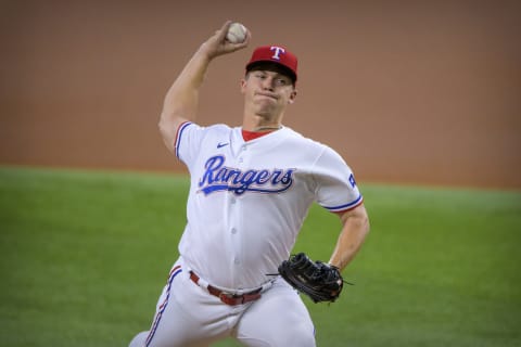 Sep 30, 2021; Arlington, Texas, USA; Texas Rangers starting pitcher Glenn Otto (49) pitches against the Los Angeles Angels during the first inning at Globe Life Field. Mandatory Credit: Jerome Miron-USA TODAY Sports