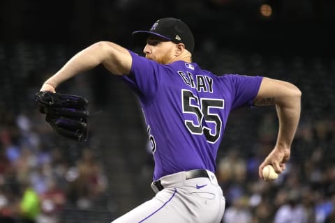 Oct 1, 2021; Phoenix, Arizona, USA; Colorado Rockies starting pitcher Jon Gray (55) throws against the Arizona Diamondbacks in the first inning at Chase Field. Mandatory Credit: Rick Scuteri-USA TODAY Sports