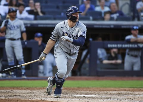 Oct 2, 2021; Bronx, New York, USA; Tampa Bay Rays left fielder Austin Meadows (17) hits a three run home run in the seventh inning against the New York Yankees at Yankee Stadium. Mandatory Credit: Wendell Cruz-USA TODAY Sports