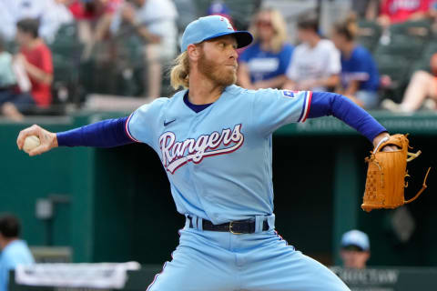 Oct 3, 2021; Arlington, Texas, USA; Texas Rangers relief pitcher Mike Foltynewicz (20) delivers a pitch to the Cleveland Indians during the fifth inning game at Globe Life Field. Mandatory Credit: Jim Cowsert-USA TODAY Sports