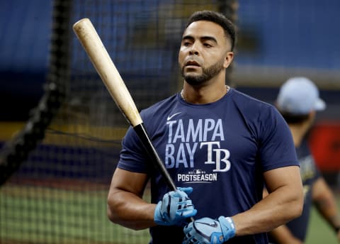 Oct 7, 2021; St. Petersburg, Florida, USA; Tampa Bay Rays designated hitter Nelson Cruz warms up before game one of the 2021 ALDS at Tropicana Field. Mandatory Credit: Kim Klement-USA TODAY Sports