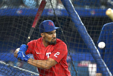 Apr 9, 2022; Toronto, Ontario, CAN; Texas Rangers second baseman Marcus Semien (2) takes batting practice before playing the Toronto Blue Jays at Rogers Centre. Mandatory Credit: Dan Hamilton-USA TODAY Sports