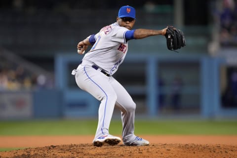 Jun 4, 2022; Los Angeles, California, USA; New York Mets relief pitcher Joely Rodriguez (30) delivers against the Los Angeles Dodgers in the eighth inning at Dodger Stadium. Mandatory Credit: Kirby Lee-USA TODAY Sports