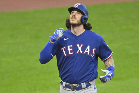 Jun 7, 2022; Cleveland, Ohio, USA; Texas Rangers catcher Jonah Heim (28) celebrates his solo home run in the fourth inning against the Cleveland Guardians at Progressive Field. Mandatory Credit: David Richard-USA TODAY Sports