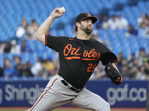 Jun 14, 2022; Toronto, Ontario, CAN; Baltimore Orioles starting pitcher Jordan Lyles (28) pitches to the Toronto Blue Jays during the first inning at Rogers Centre. Mandatory Credit: John E. Sokolowski-USA TODAY Sports