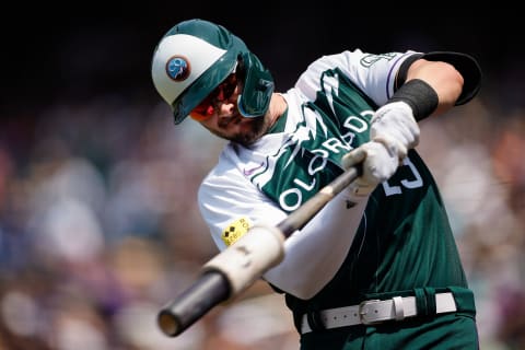 Jul 31, 2022; Denver, Colorado, USA; Colorado Rockies left fielder Kris Bryant (23) warms up on deck in the first inning against the Los Angeles Dodgers at Coors Field. Mandatory Credit: Isaiah J. Downing-USA TODAY Sports