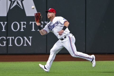 Aug 1, 2022; Arlington, Texas, USA; Texas Rangers right fielder Kole Calhoun (56) in action during the game between the Texas Rangers and the Baltimore Orioles at Globe Life Field. Mandatory Credit: Jerome Miron-USA TODAY Sports