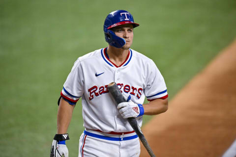 Sep 25, 2022; Arlington, Texas, USA; Texas Rangers shortstop Corey Seager (5) reacts to striking out against the Cleveland Guardians during the sixth inning at Globe Life Field. Mandatory Credit: Jerome Miron-USA TODAY Sports