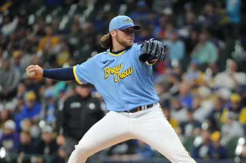 Sep 30, 2022; Milwaukee, Wisconsin, USA; Milwaukee Brewers starting pitcher Corbin Burnes (39) delivers a pitch against the Miami Marlins in the first inning at American Family Field. Mandatory Credit: Michael McLoone-USA TODAY Sports