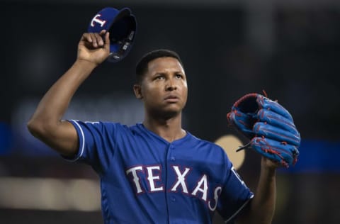 Jun 22, 2019; Arlington, TX, USA; Texas Rangers relief pitcher Jose Leclerc (25) reacts to retiring the side during the eighth inning against the Chicago White Sox at Globe Life Park in Arlington. Mandatory Credit: Jerome Miron-USA TODAY Sports