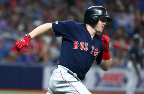 Sep 20, 2019; St. Petersburg, FL, USA; Boston Red Sox right fielder Brock Holt (12) doubles during the seventh inning against the Tampa Bay Rays at Tropicana Field. Mandatory Credit: Kim Klement-USA TODAY Sports