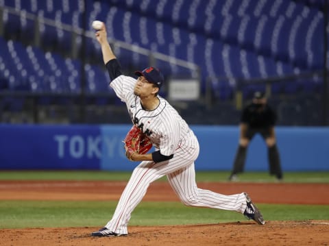 Aug 7, 2021; Yokohama, Japan; Team Japan pitcher Koudai Senga (21) throws in the 6th inning against USA in the baseball gold medal match during the Tokyo 2020 Olympic Summer Games at Yokohama Baseball Stadium. Mandatory Credit: Yukihito Taguchi-USA TODAY Sports