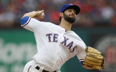 Apr 28, 2017; Arlington, TX, USA; Texas Rangers starting pitcher Nick Martinez (22) delivers a pitch against the Los Angeles Angels during a game at Globe Life Park in Arlington. Mandatory Credit: Jim Cowsert-USA TODAY Sports