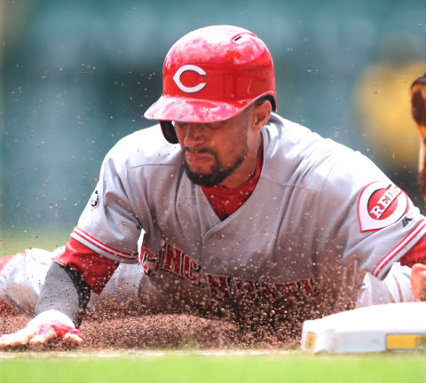 Aug 7, 2016; Pittsburgh, PA, USA; Cincinnati Reds center fielder Billy Hamilton (6) steals third base against the Pittsburgh Pirates during the first inning at PNC Park. Mandatory Credit: Charles LeClaire-USA TODAY Sports