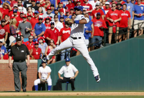 October 6, 2016; Arlington, TX, USA; Texas Rangers shortstop Elvis Andrus (1) throws to first for the out against Toronto Blue Jays center fielder Kevin Pillar (11) in the second inning during game one of the 2016 ALDS playoff baseball game at Globe Life Park in Arlington. Mandatory Credit: Tim Heitman-USA TODAY Sports