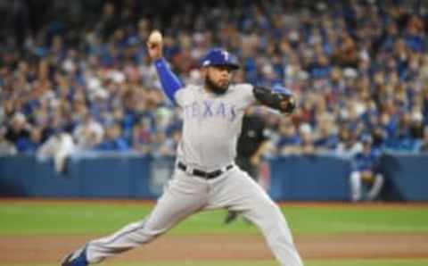 Oct 9, 2016; Toronto, Ontario, CAN; Texas Rangers relief pitcher Jeremy Jeffress throws a pitch against the Toronto Blue Jays in the 5th inning during game three of the 2016 ALDS playoff baseball series at Rogers Centre. Mandatory Credit: Dan Hamilton-USA TODAY Sports