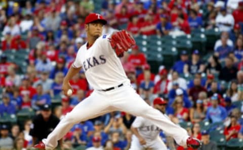 Apr 8, 2017; Arlington, TX, USA; Texas Rangers starting pitcher Yu Darvish (11) delivers to the plate in the top of the first inning against the Oakland Athletics at Globe Life Park in Arlington. Mandatory Credit: Ray Carlin-USA TODAY Sports