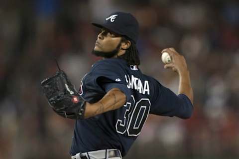 Sep 9, 2014; Washington, DC, USA; Atlanta Braves starting pitcher Ervin Santana (30) pitches during the fifth inning against the Washington Nationals at Nationals Park. Washington Nationals defeated against the Atlanta Braves 6-4. Mandatory Credit: Tommy Gilligan-USA TODAY Sports