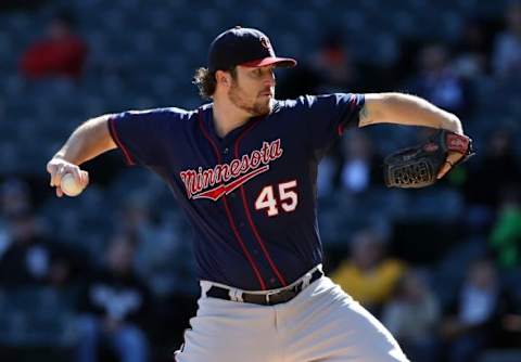 Sep 13, 2014; Chicago, IL, USA; Minnesota Twins starting pitcher Phil Hughes (45) throws a pitch against the Chicago White Sox during the third inning in game one of a doubleheader at U.S Cellular Field. Mandatory Credit: Jerry Lai-USA TODAY Sports