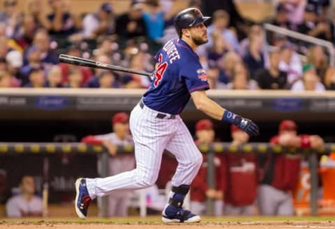 Sep 23, 2014; Minneapolis, MN, USA; Minnesota Twins designated hitter Trevor Plouffe (24) hits a single in the first inning against the Arizona Diamondbacks at Target Field. The Minnesota Twins win 6-3. Mandatory Credit: Brad Rempel-USA TODAY Sports