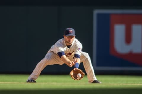 Oct 3, 2015; Minneapolis, MN, USA; Minnesota Twins second baseman Brian Dozier (2) fields a ball hit by the Kansas City Royals at Target Field. The Royals win 5-1. Mandatory Credit: Bruce Kluckhohn-USA TODAY Sports