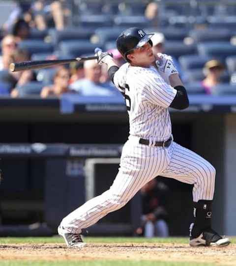 Sep 7, 2015; Bronx, NY, USA; New York Yankees catcher John Ryan Murphy (66) follows through on a two run home run against the Baltimore Orioles during the fifth inning at Yankee Stadium. Mandatory Credit: Brad Penner-USA TODAY Sports