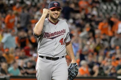 Aug 22, 2015; Baltimore, MD, USA; Minnesota Twins relief pitcher Kevin Jepsen (49) celebrates on the field after earning the save against the Baltimore Orioles at Oriole Park at Camden Yards. Minnesota Twins defeated Baltimore Orioles 3-2. Mandatory Credit: Tommy Gilligan-USA TODAY Sports