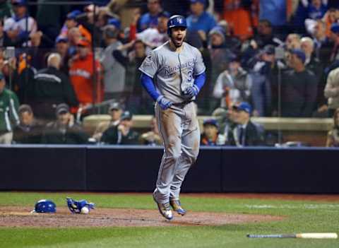 Nov 1, 2015; New York City, NY, USA; Kansas City Royals first baseman Eric Hosmer (35) reacts after scoring the tying run against the New York Mets in the 9th inning in game five of the World Series at Citi Field. Mandatory Credit: Brad Penner-USA TODAY Sports