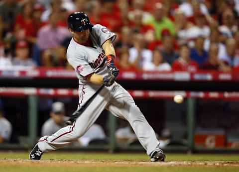 Jul 14, 2015; Cincinnati, OH, USA; American League second baseman Brian Dozier (2) of the Minnesota Twins hits a solo home run against the National League during the eighth inning of the 2015 MLB All Star Game at Great American Ball Park. Mandatory Credit: Rick Osentoski-USA TODAY Sports