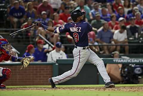 Jul 9, 2016; Arlington, TX, USA; Minnesota Twins shortstop Eduardo Nunez (9) hits a two-run home run during the fourth inning against the Texas Rangers at Globe Life Park in Arlington. Mandatory Credit: Kevin Jairaj-USA TODAY Sports