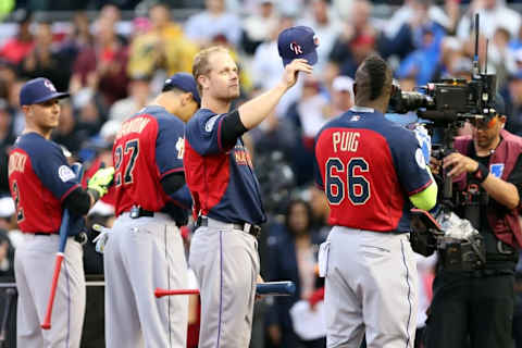 Jul 14, 2014; Minneapolis, MN, USA; National League infielder Justin Morneau (33) of the Colorado Rockies tips his cap to the crowd before the first round during the 2014 Home Run Derby the day before the MLB All Star Game at Target Field. Mandatory Credit: Jesse Johnson-USA TODAY Sports