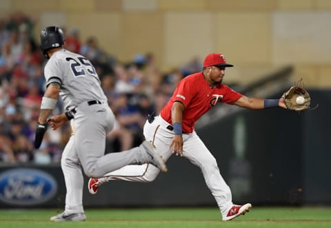 MINNEAPOLIS, MN – JULY 22: Gleyber Torres #25 of the New York Yankees runs to third base as Luis Arraez #2 of the Minnesota Twins fields the ball hit by Gio Urshela #29 of the New York Yankees during the sixth inning of the game on July 22, 2019 at Target Field in Minneapolis, Minnesota. (Photo by Hannah Foslien/Getty Images)