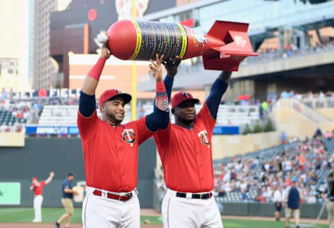 MINNEAPOLIS, MN – SEPTEMBER 06: Nelson Cruz #23 and Miguel Sano #22 of the Minnesota Twins are presented an award by the Minneapolis bomb squad for the setting the MLB single season home run record before the game against the Cleveland Indians of the game on SEPTEMBER 6, 2019 at Target Field in Minneapolis, Minnesota. (Photo by Hannah Foslien/Getty Images)