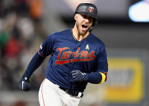 MINNEAPOLIS, MINNESOTA – SEPTEMBER 07: Mitch Garver #18 of the Minnesota Twins celebrates as he rounds the bases after hitting a three-run home run against the Cleveland Indians during the seventh inning of the game at Target Field on September 7, 2019 in Minneapolis, Minnesota. (Photo by Hannah Foslien/Getty Images)