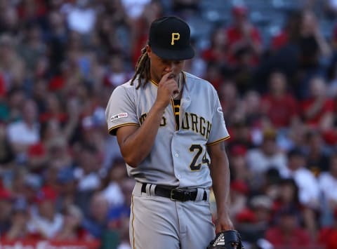 ANAHEIM, CALIFORNIA – AUGUST 14: Pitcher Chris Archer #24 of the Pittsburgh Pirates reacts after giving up an rbi single to Albert Pujols #5 of the Los Angeles Angels (not in photo) in the fourth inning of their MLB game at Angel Stadium of Anaheim on August 14, 2019 in Anaheim, California. (Photo by Victor Decolongon/Getty Images)