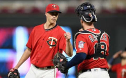 Minnesota Twins’ Taylor Rogers and Mitch Garver (Photo by Hannah Foslien/Getty Images)