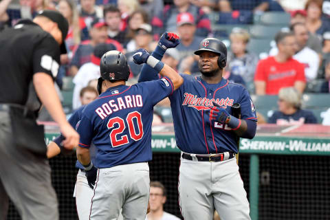 CLEVELAND, OHIO – SEPTEMBER 14: Eddie Rosario #20 celebrates with Miguel Sano #22 of the Minnesota Twins after Rosario hit a two run homer during the first inning of the second game of a double header against the Cleveland Indians at Progressive Field on September 14, 2019 in Cleveland, Ohio. (Photo by Jason Miller/Getty Images)